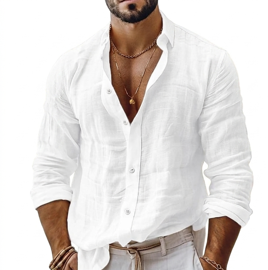 Man wearing a white button-up shirt and beige pants with a plain background